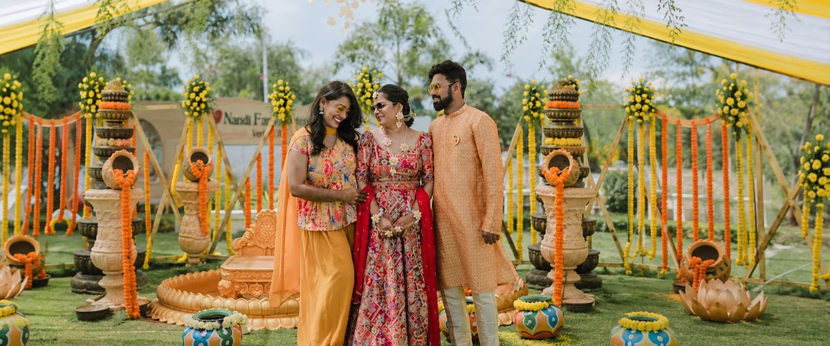 Traditional Indian family at festive wedding decor